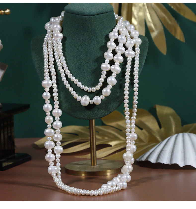 Threaded natural freshwater pearl sweater chain