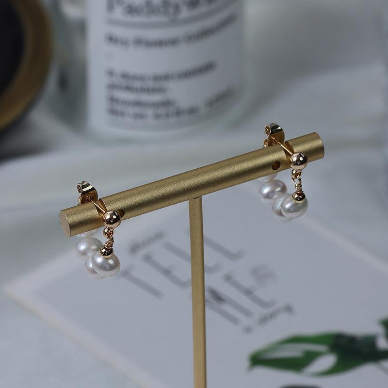 One pair of freshwater pearl earrings.