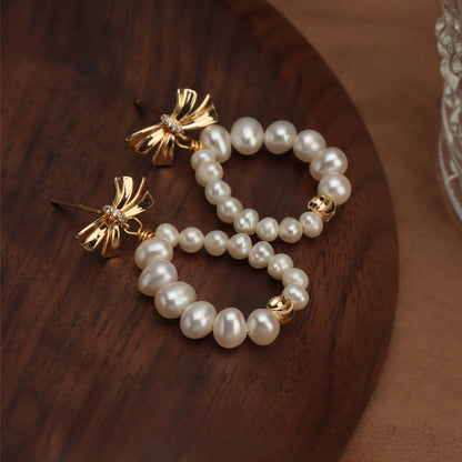 Bow pearl stud earrings