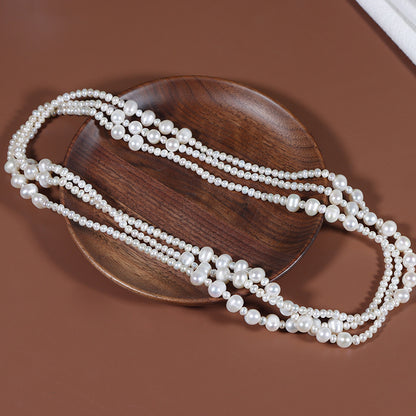 Threaded natural freshwater pearl sweater chain