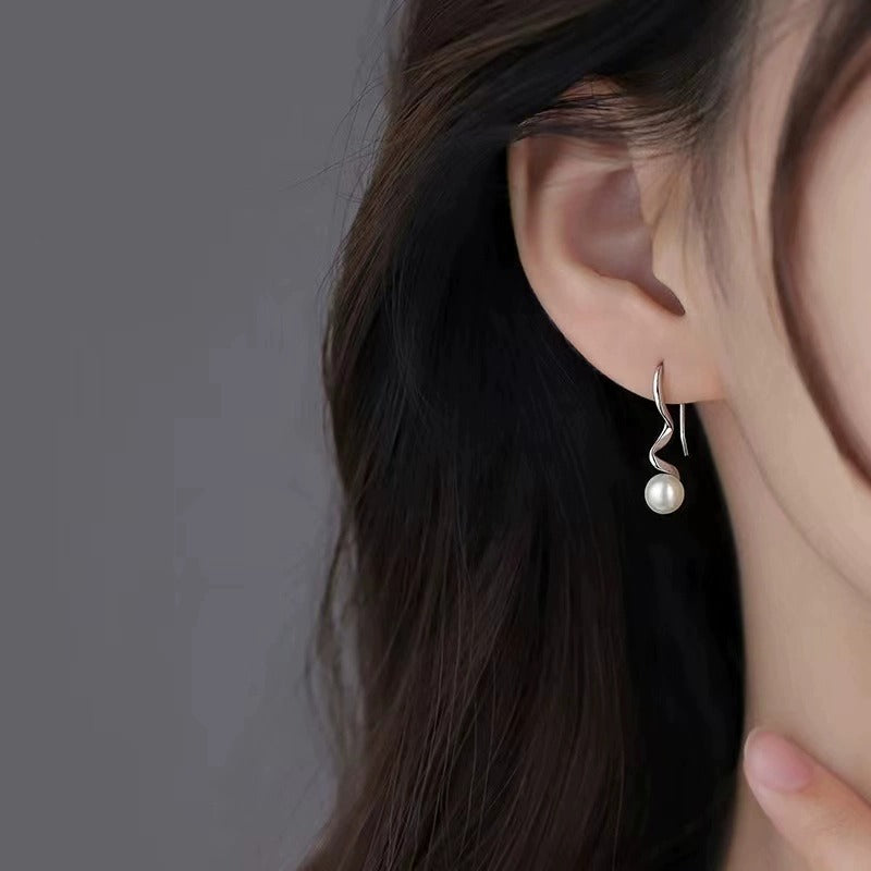 Spiral wave texture design pearl stud earrings