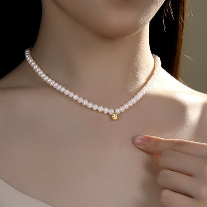 Metal beads embellished with freshwater pearl necklace