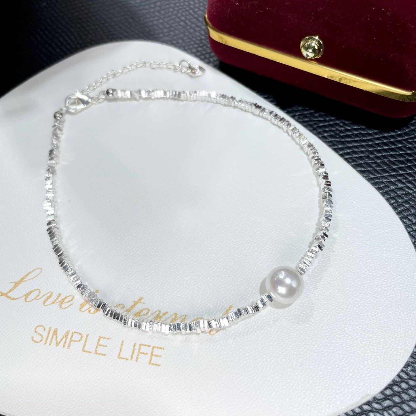 Broken silver design pearl bracelet