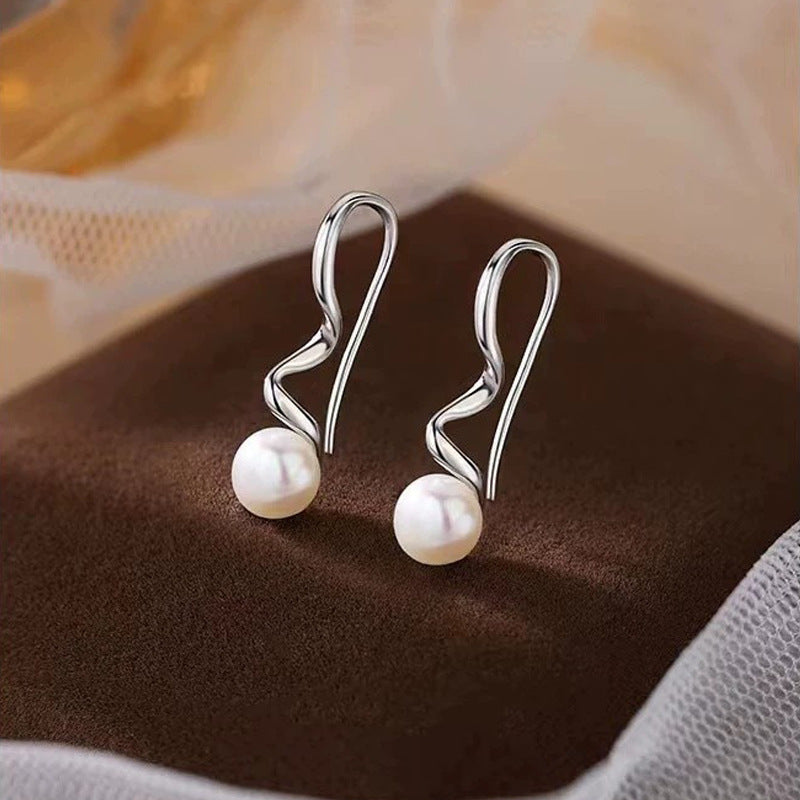 Spiral wave texture design pearl stud earrings