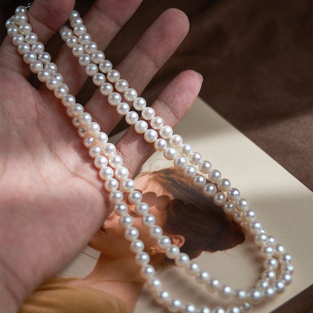Bow pearl necklace