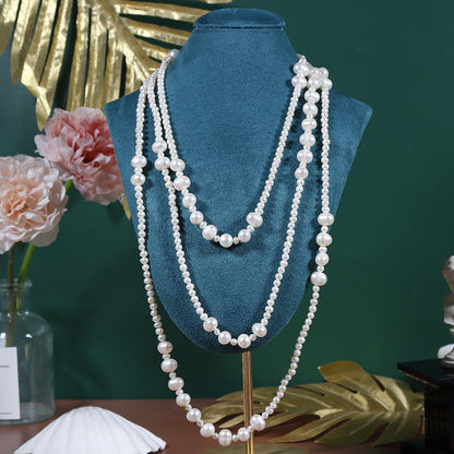 Threaded natural freshwater pearl sweater chain