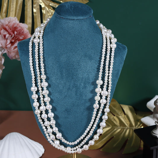 Threaded natural freshwater pearl sweater chain