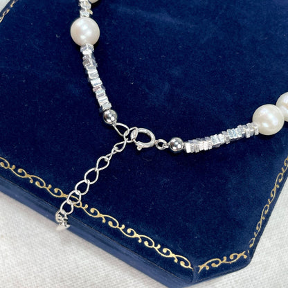 Broken silver design pearl bracelet