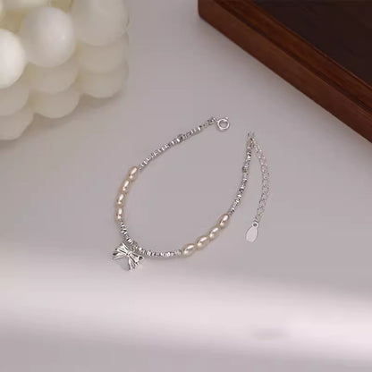 Bow Shredded Silver Natural Pearl Bracelet