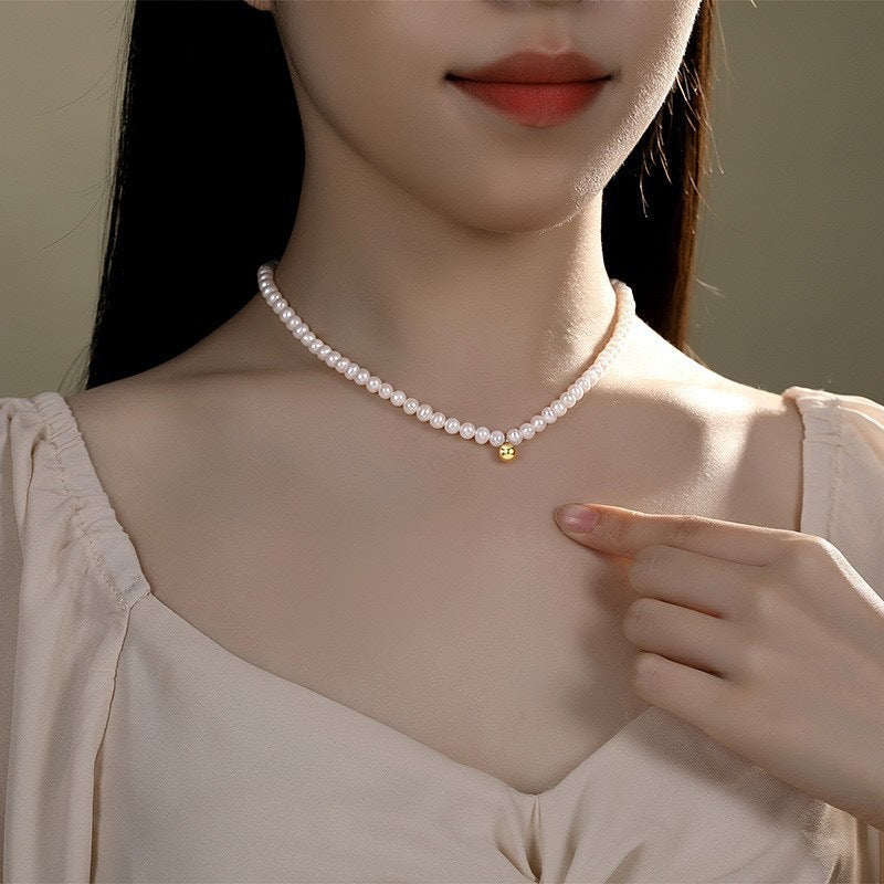 Metal beads embellished with freshwater pearl necklace