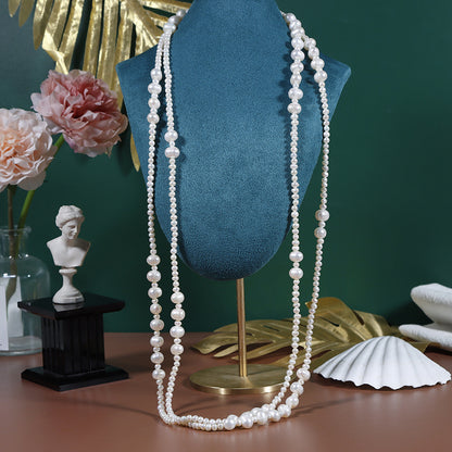 Threaded natural freshwater pearl sweater chain