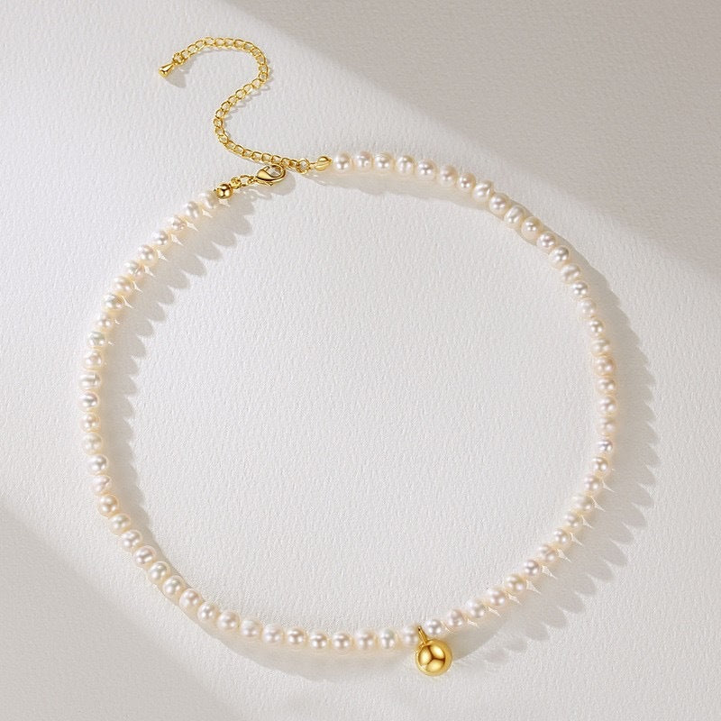 Metal beads embellished with freshwater pearl necklace