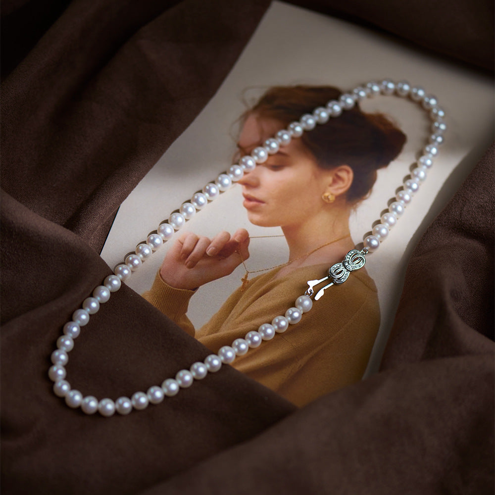 Bow pearl necklace
