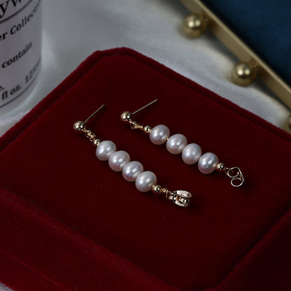 One pair of freshwater pearl earrings.
