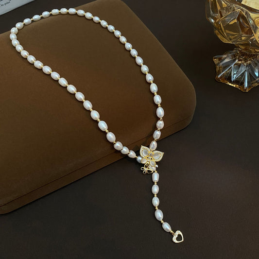 Natural pearl long butterfly temperament sweater chain